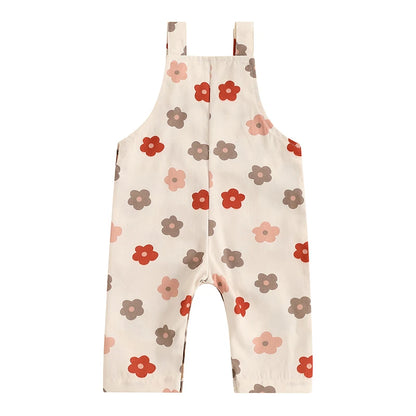 Bubebaby BabyLove Floral Jumpsuit Dungaree Romper. The romper features a floral pattern with a mix of vibrant colors. Featuring a pocket on the chest with shoulder straps, and snap closures at the bottom for easy diaper changes.