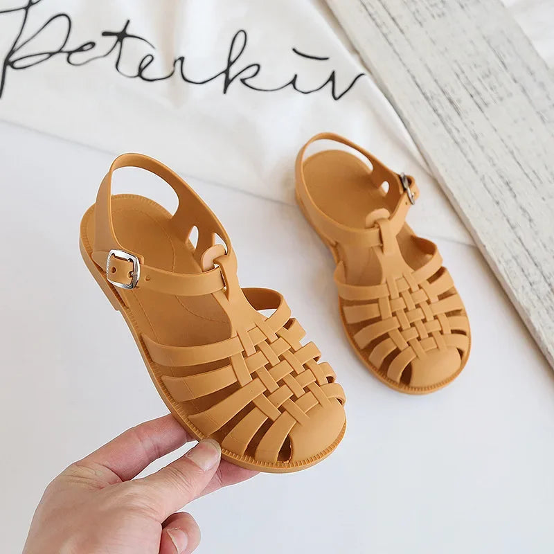 BabyLove Silicone Jelly Sandal at BubeBaby. These sandals feature a plastic outsole for durability and are designed with quick-dry, breathable, and anti-slippery features. Available in lengths of 10cm, 10.5cm, and 11cm, perfect for active little feet. Shop now for comfort and style