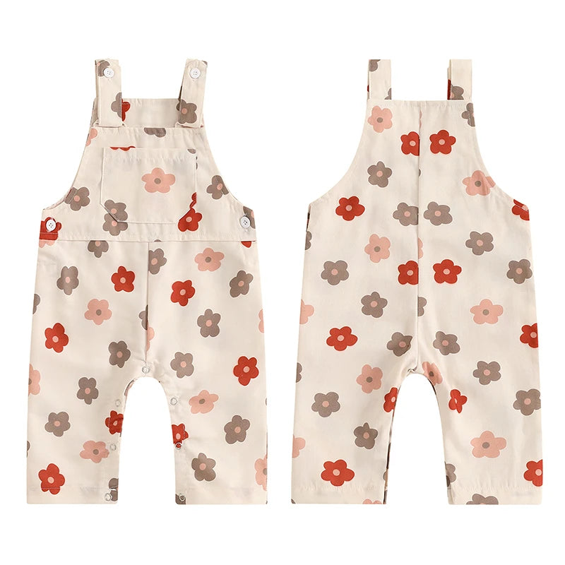 Bubebaby BabyLove Floral Jumpsuit Dungaree Romper. The romper features a floral pattern with a mix of vibrant colors. Featuring a pocket on the chest with shoulder straps, and snap closures at the bottom for easy diaper changes.