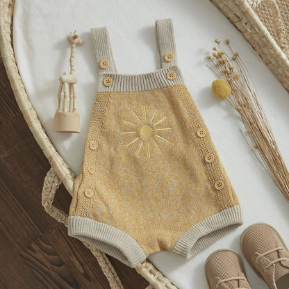  Baby unisex romper made from high-quality cotton and polyester, suitable for ages 0-24 months. The romper features a sleeveless design, straight collar, covered button closure, and a charming print pattern. Ideal for all seasons and available in various sizes to ensure a perfect fit.