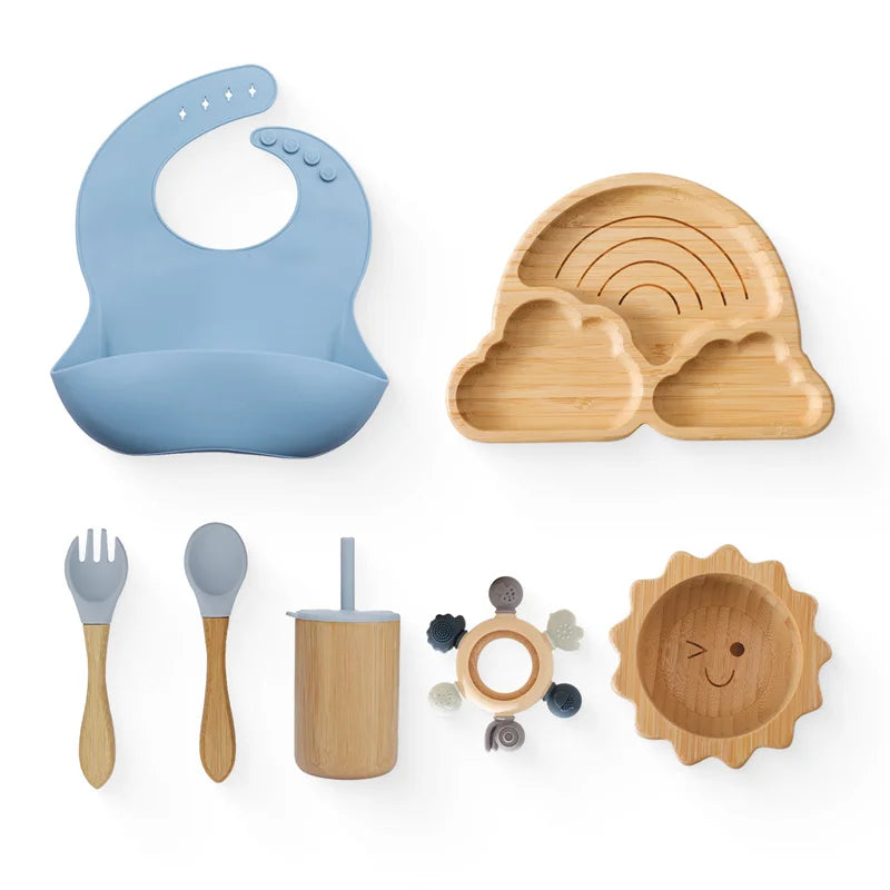 Eco-friendly Bubebaby Babylove 6-piece/7-piece Bamboo and Silicone Dinnerware Set for babies aged 6 months to 6 years. Made from BPA-free silicone and bamboo wood, this set includes a bowl, plate, fork, spoon, and teething toys, providing a safe and healthy mealtime experience. Certified by CE, EU, CIQ, and other standards for safety and quality