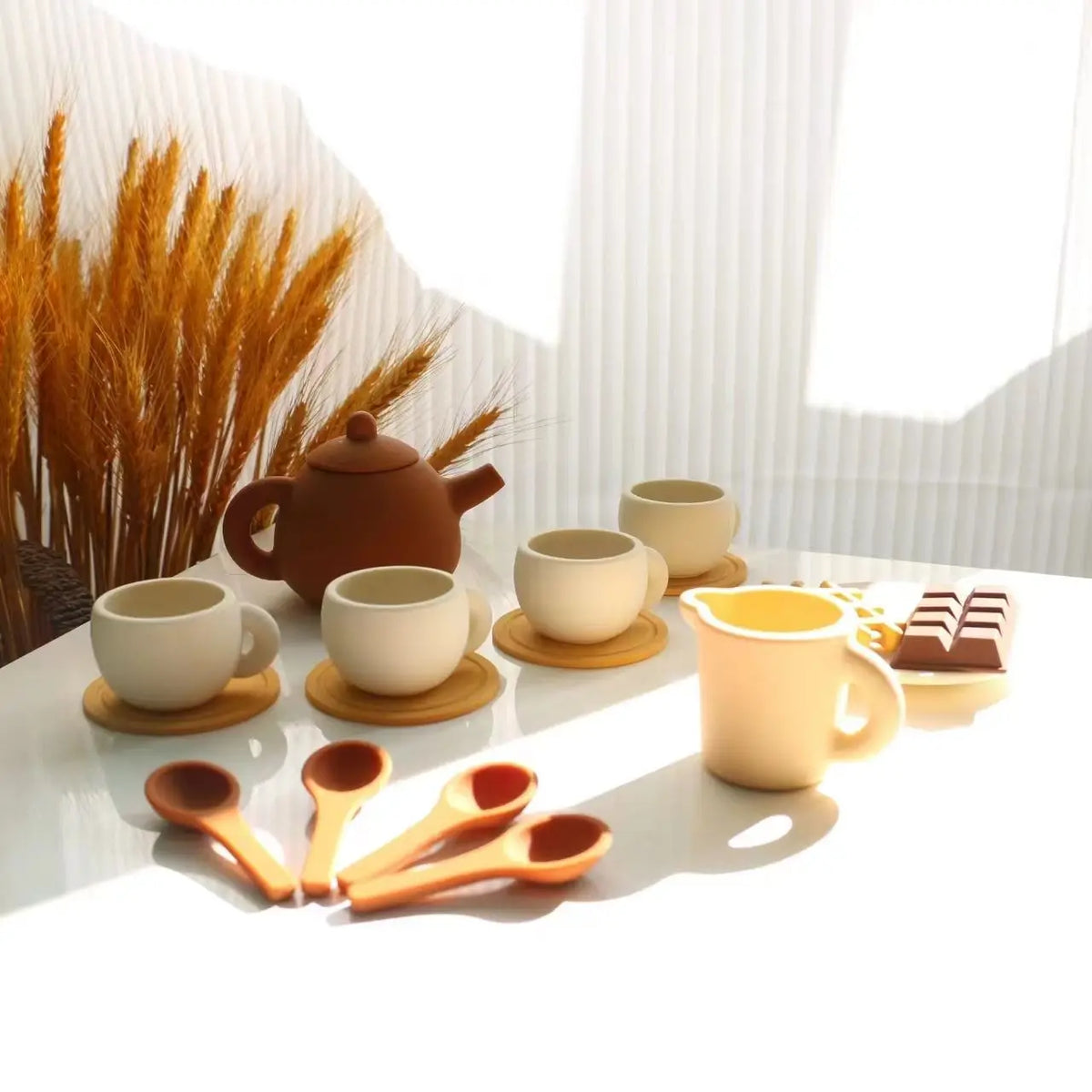 Silicone afternoon tea set laid out on a sunny table