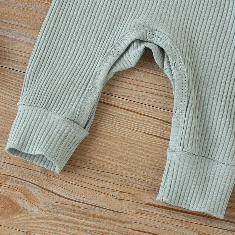 Bubebaby BabyLove Cotton Overall Playsuit with snap buttons along the legs for easy diaper changes. Made from breathable, high-quality cotton for maximum comfort