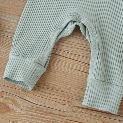 Bubebaby BabyLove Cotton Overall Playsuit with snap buttons along the legs for easy diaper changes. Made from breathable, high-quality cotton for maximum comfort