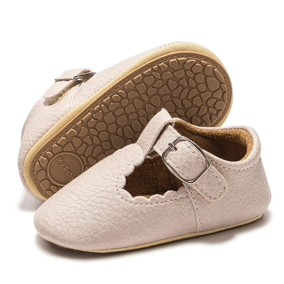 Bubebaby BabyLove faux leather dress shoes in a classic look. The shoes feature a sleek, polished design perfect for special occasions or formal wear. With a soft, cushioned interior for comfort