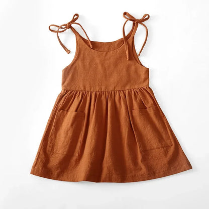 A BabyLove by Bubebaby light and breezy summer dress with spaghetti straps, designed for babies. The dress features a loose, relaxed fit and a soft, comfortable fabric, perfect for keeping little ones cool on warm days