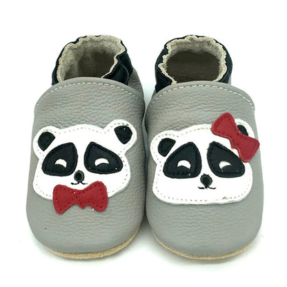Bubebaby BabyLove Cow Leather First Walker Booties, featuring a classic design with a comfortable fit for early walkers. The booties are equipped with a flexible sole to support baby’s first steps. They come in a versatile colors, making them a stylish and practical choice for little ones