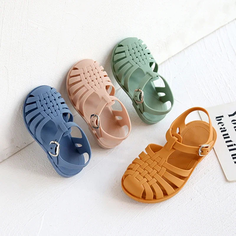 BabyLove Silicone Jelly Sandal at BubeBaby. These sandals feature a plastic outsole for durability and are designed with quick-dry, breathable, and anti-slippery features. Available in lengths of 10cm, 10.5cm, and 11cm, perfect for active little feet. Shop now for comfort and style