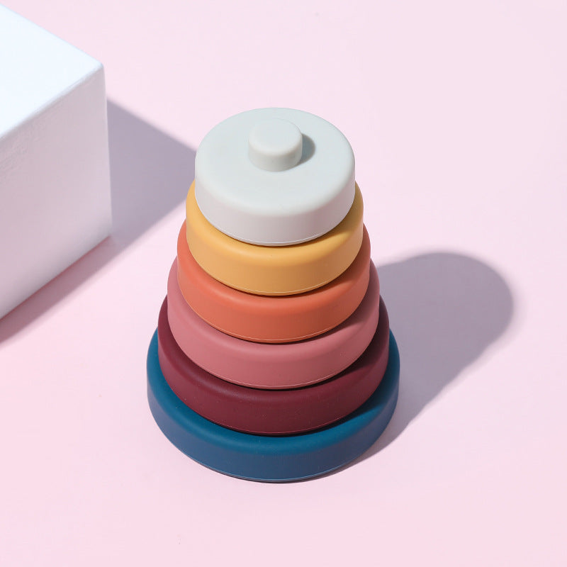Close-up of earth tones silicone stacking ring tower