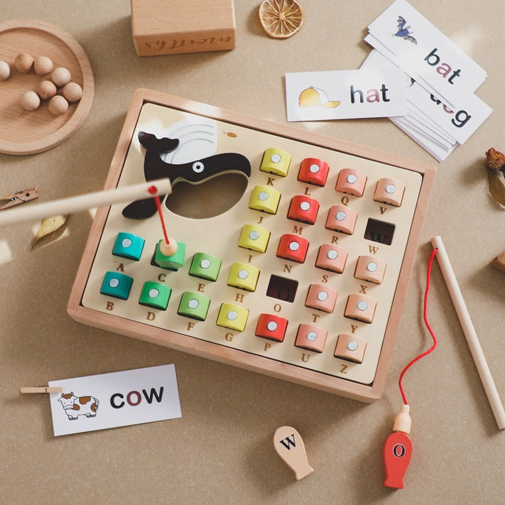 Wooden alphabet fishing game on a table with word cards