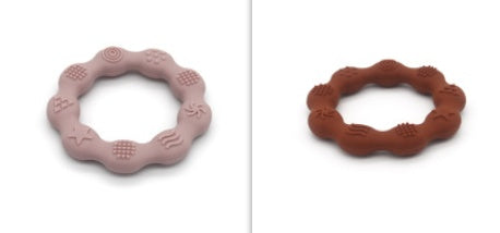Silicone textured ring teether pair in light pink and rust brown
