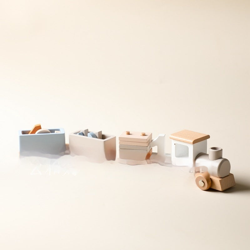 Wooden birthday train linked together on a table