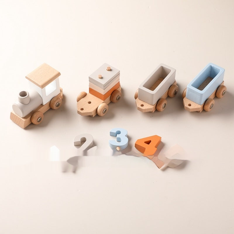 Wooden train carriages with numbers 2, 3 and 4