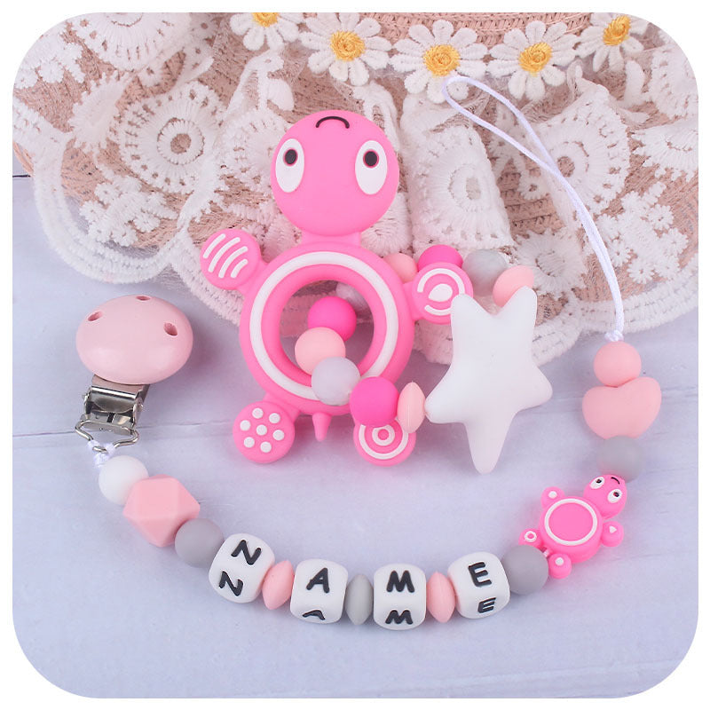 Silicone turtle teether pacifier clip pink on lace