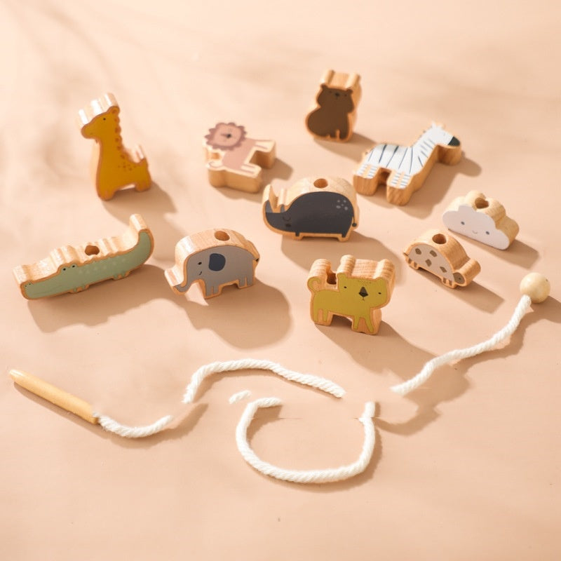 Wooden animal lacing toy pieces with cotton cord
