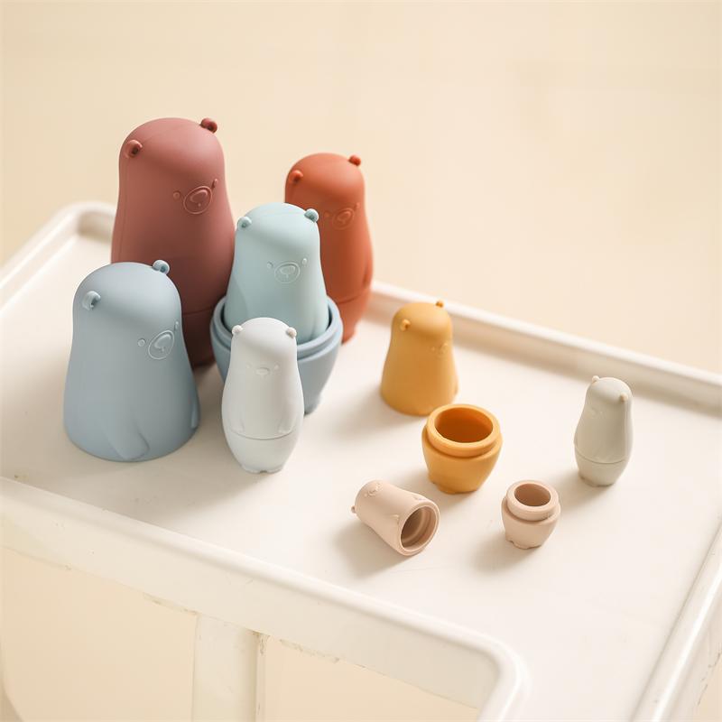 Silicone nesting dolls opened on a tray