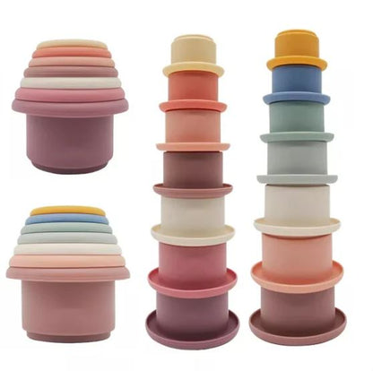 Discover the Montessori Silicone Stacking Cups at BubeBaby. Made from durable ABS, these versatile cups are perfect for beach, bath, and indoor play. Packaged in a net bag, they offer endless fun . Ideal for sensory play and skill development